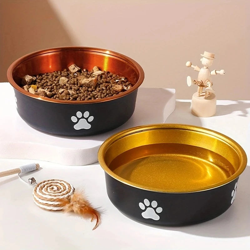 Two stylish pet bowls sit on a surface, one filled with kibbles and treats and the other with water.