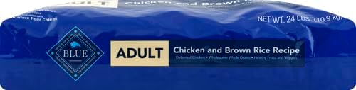 A blue bag of dog food labeled "BLUE Adult Chicken and Brown Rice Recipe," weighing 24 lbs, emphasizing wholesome ingredients.