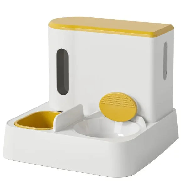 Modern pet feeder in white and yellow, featuring a food bowl and a water reservoir with a coin-shaped dispenser.