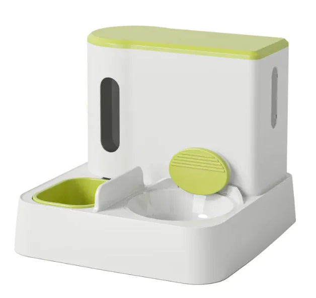 A modern pet feeding station featuring a white base with a lime green top, including two bowls and a clear food storage compartment.
