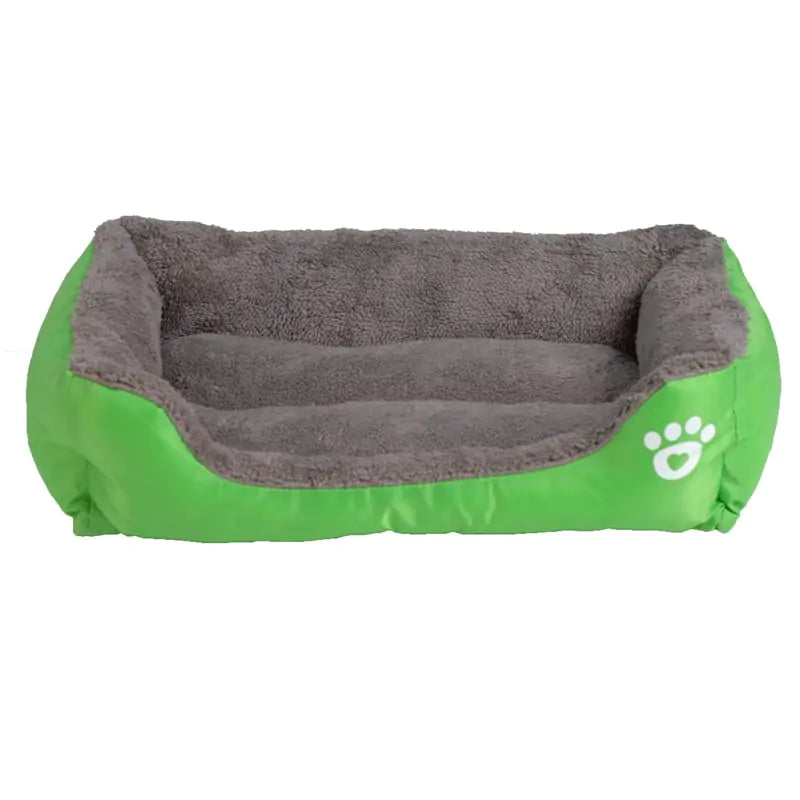 Cozy pet bed featuring a plush gray interior and a vibrant green exterior with a paw print design. Ideal for small dogs or cats.