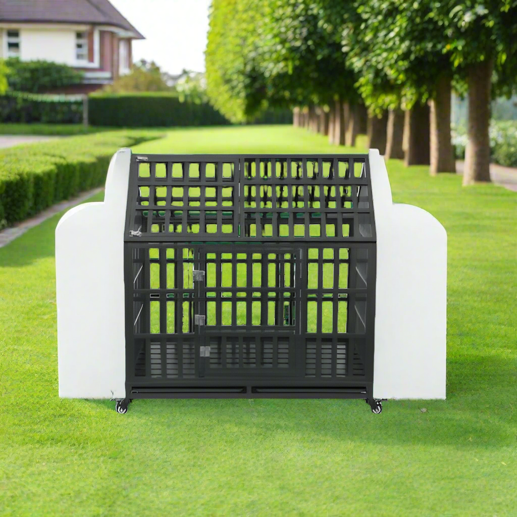 A black dog crate with a white base, set on a green lawn surrounded by trees and a house in the background.