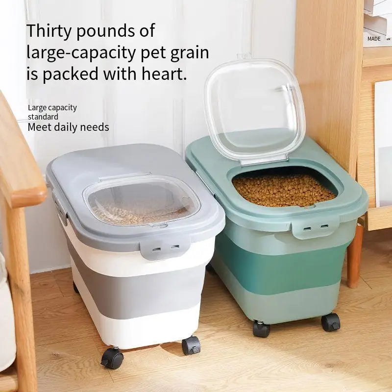 Two large pet food storage containers, one gray and one teal, each holding kibble, are placed beside a wooden shelf in a cozy room.