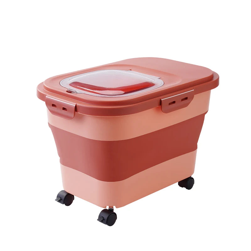 Plastic storage bin in warm peach and terracotta colors, featuring a clear lid and rolling wheels for easy mobility.