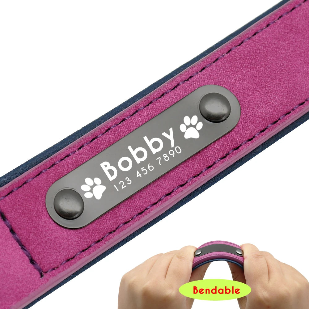 A pink pet collar with a metal tag engraved and a label, showcasing its flexibility.