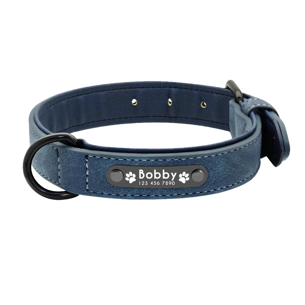 A blue dog collar with a blue inner lining with tag.