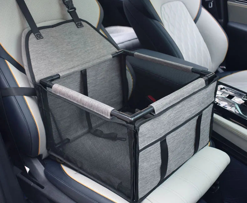 Travel Dog Car Seat - Waterproof Pet Dog Carriers Bag - Shopinapets Dog Car Seat made with a waterproof and durable 900D Oxford and PVC material, this Pet Dog Car Seat is the perfect travel accessory for both cats and dogs. Designed to fit universal dog breeds, it measures 39*39*27cm and includes important safety features for your beloved pet. Travel Dog Car Seat - Waterproof Pet Dog Carriers Bag Shopinapets #