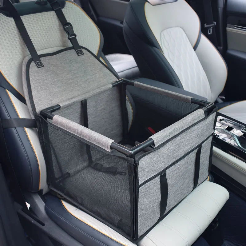 Travel Dog Car Seat - Waterproof Pet Dog Carriers Bag - Shopinapets Dog Car Seat made with a waterproof and durable 900D Oxford and PVC material, this Pet Dog Car Seat is the perfect travel accessory for both cats and dogs. Designed to fit universal dog breeds, it measures 39*39*27cm and includes important safety features for your beloved pet. Travel Dog Car Seat - Waterproof Pet Dog Carriers Bag Shopinapets #