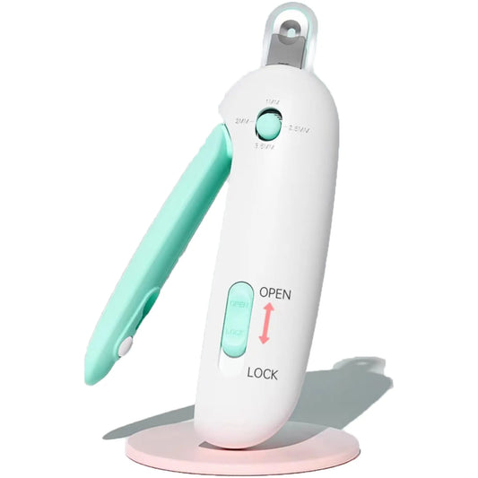 Paioxerty Cat Nail Clipper with mint handle on pink stand, debris storage, adjustable sizes for injury-free grooming.