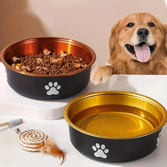 A dog sits beside two stylish pet bowls: one filled with kibble and the other with water, featuring paw prints.
