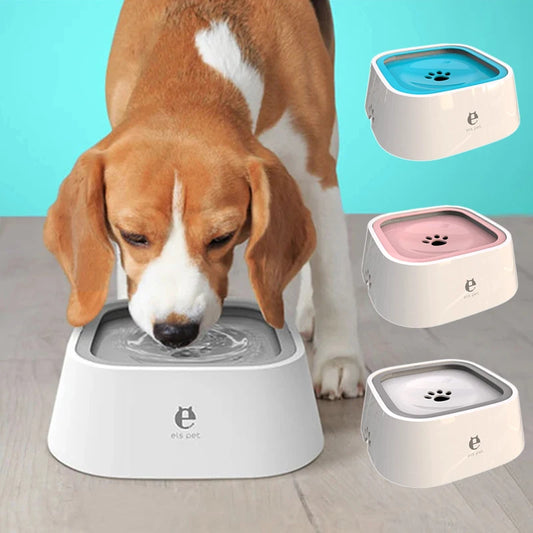 A dog is drinking from a water bowl with three colored bowls 