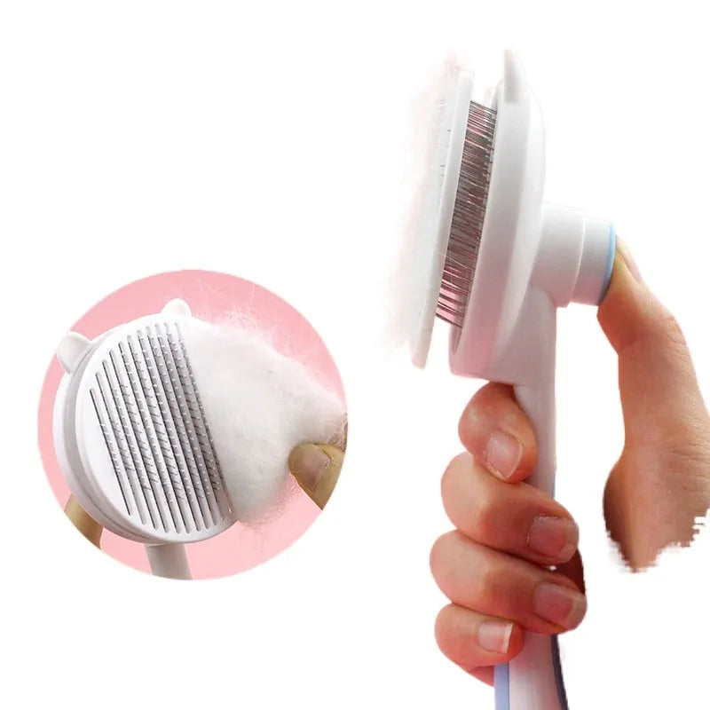 A person holding a white pet grooming brush with bristles, effectively removing fur from its surface.