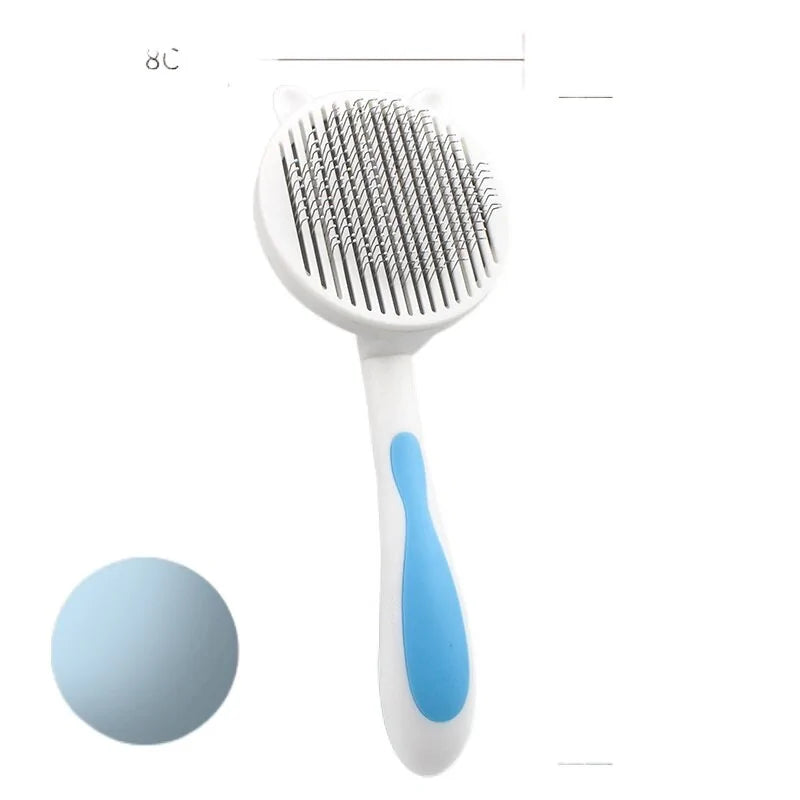 A white pet grooming brush with a round head, metal bristles, and a blue rubber grip handle, ideal for removing loose fur.