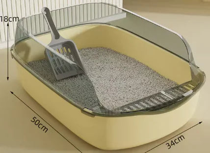 A yellow cat litter box with a transparent lid, measuring 50cm x 34cm, includes a gray scoop resting inside.