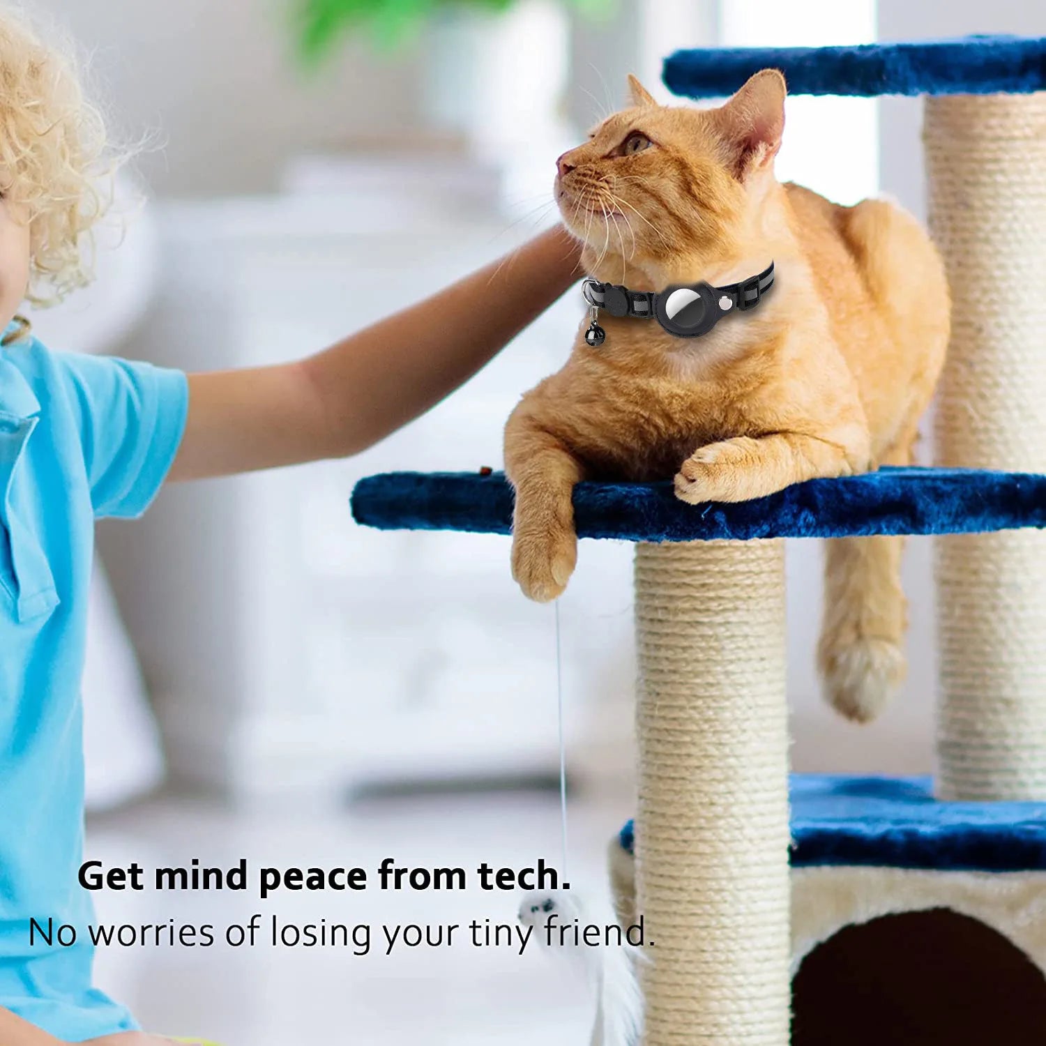 A child gently pets a cat on a cat tree, promoting peace of mind with technology for pet safety.