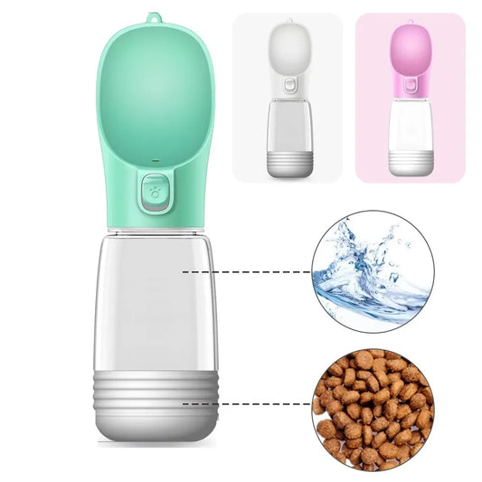 Portable pet water bottle with food storage compartment in green, pink, and white. Ideal for travel, the bottle features a built-in drinking bowl with a button for easy water release and a lower section for storing pet food. Perfect for hydration and feeding for dogs and cats.