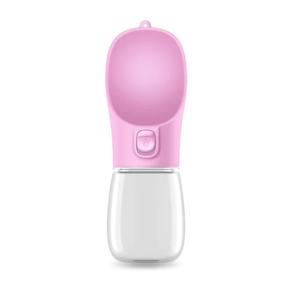 A pink portable pet feeder bottle with a rounded top and a button, designed for easy dispensing of liquids.