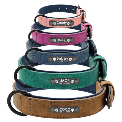 Five personalized pet collars in various colors, each labeled with names and contact numbers, stacked neatly.