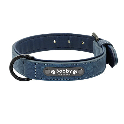 A blue dog collar with a blue inner lining with tag.