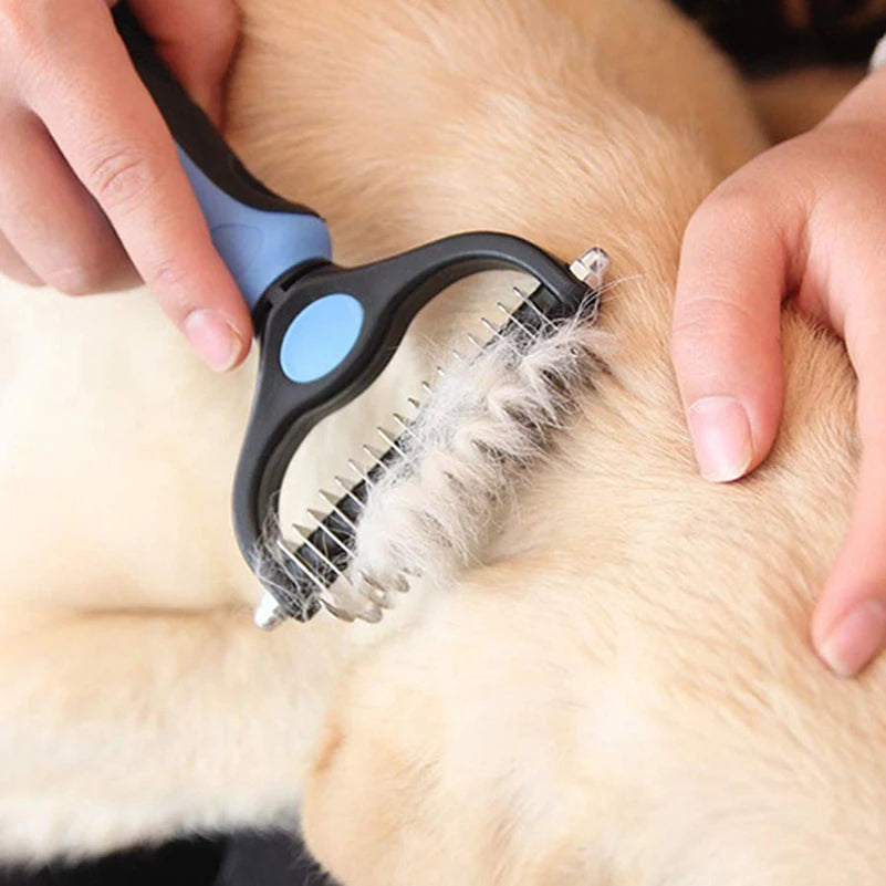 Grooming tool removing fur from a pet's coat being held by a human hand.