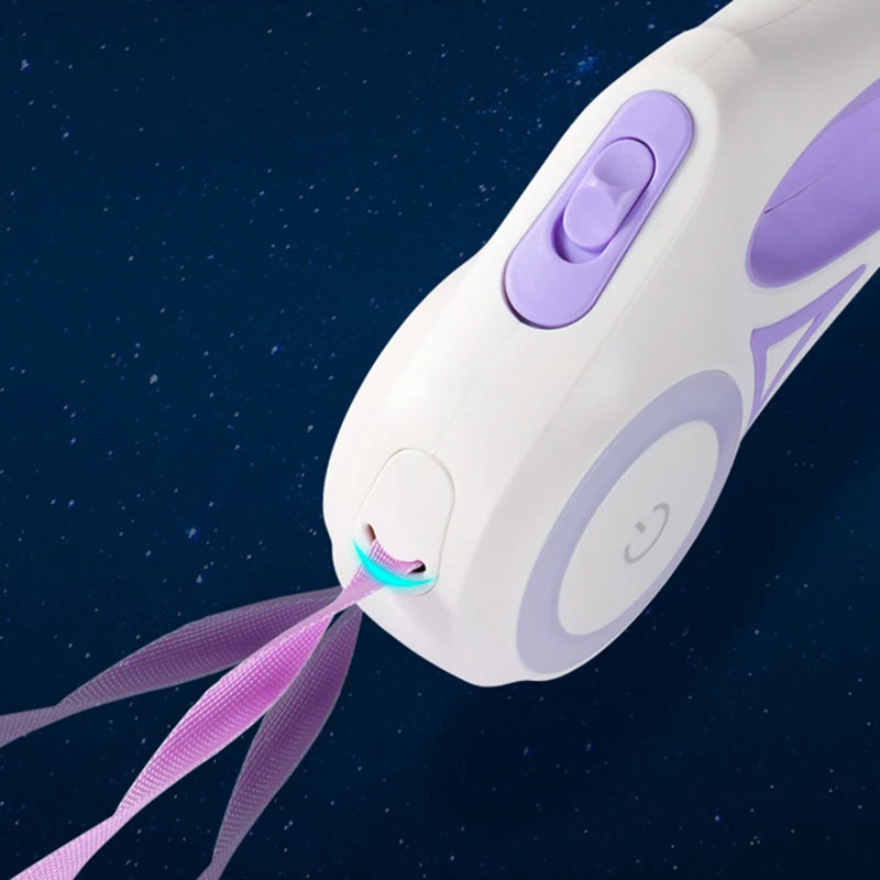 A close-up of a white and purple ribbon cutter, featuring glowing ribbon and buttons, set against a dark starry background.