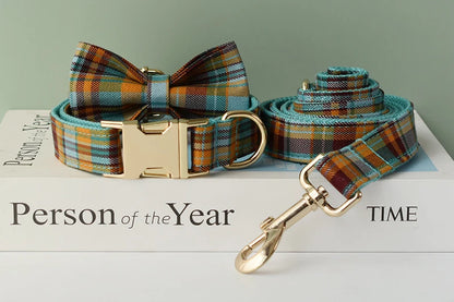 Plaid dog collar and leash set on a magazine with 'Person of the Year' and 'TIME' text.