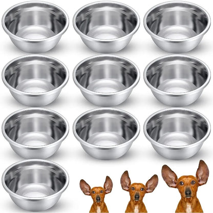 Set of stainless steel bowls with small dog illustrations at the bottom.