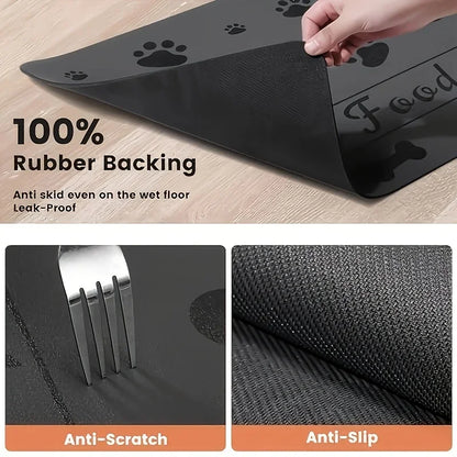 Black pet mat with paw prints on a wooden floor, featuring text about its properties.