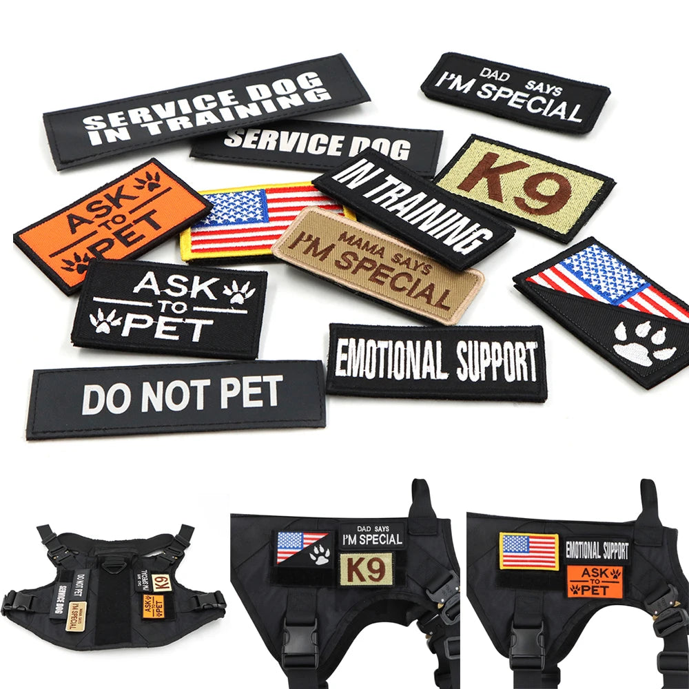 Collection of dog patches and harnesses with various messages on a white background