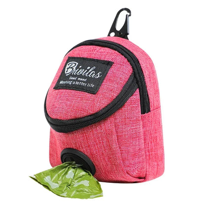 Pink dog waste bag dispenser with a carabiner on a white background