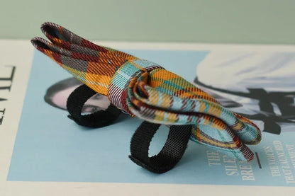 Colorful knotted fabric on a magazine page