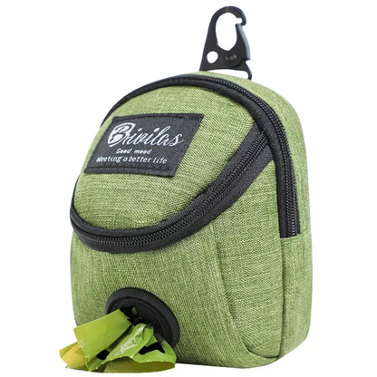 Green pet waste bag dispenser with a carabiner on a white background