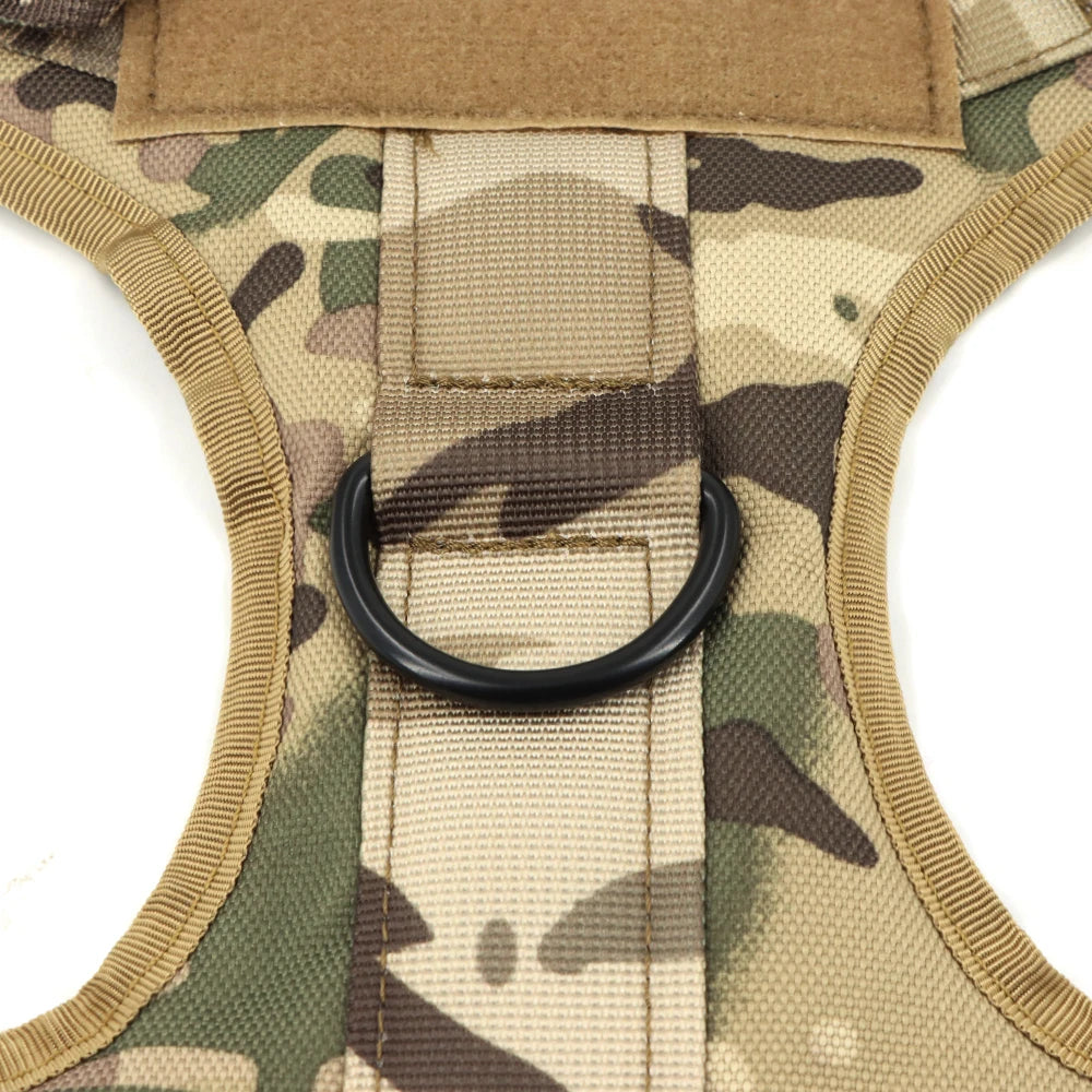 Camouflage dog harness with a D-ring on a white background
