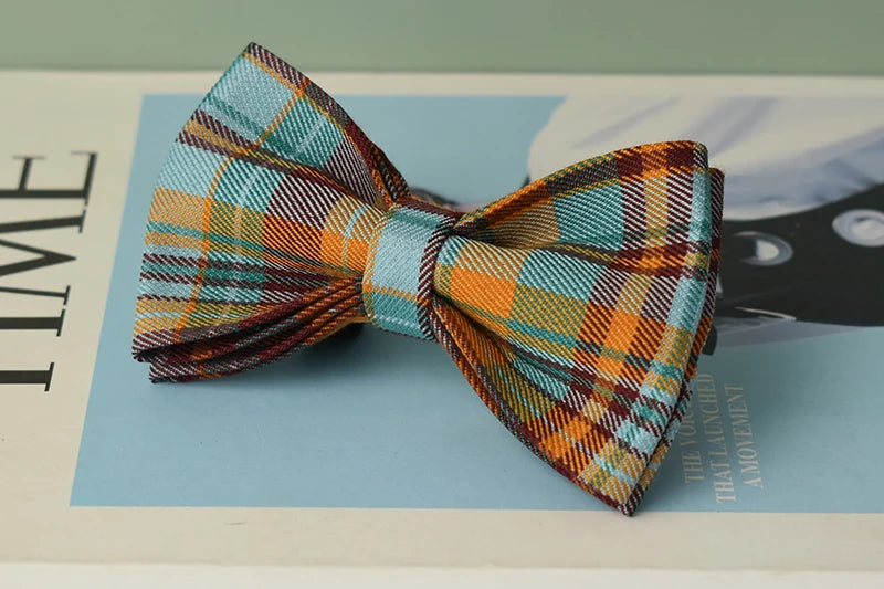 Plaid bow tie on a magazine with visible text
