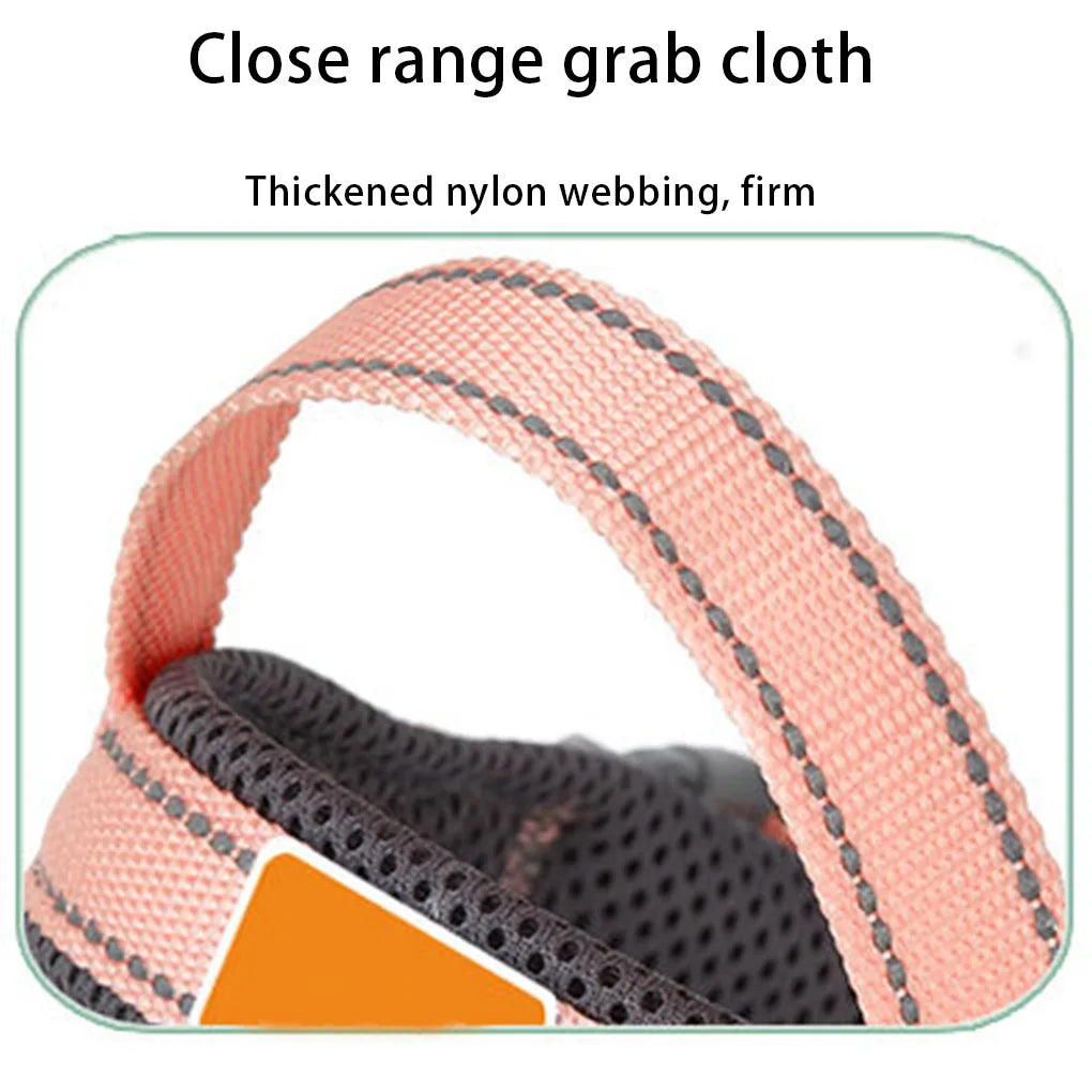 Close-up of a pink and gray grab cloth with thickened nylon webbing.