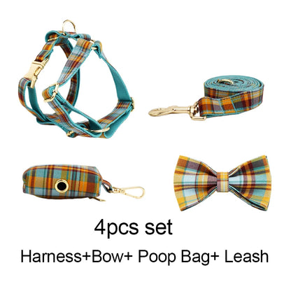 Pet accessory set with harness, bow, poop bag holder, and leash in plaid design on a white background.
