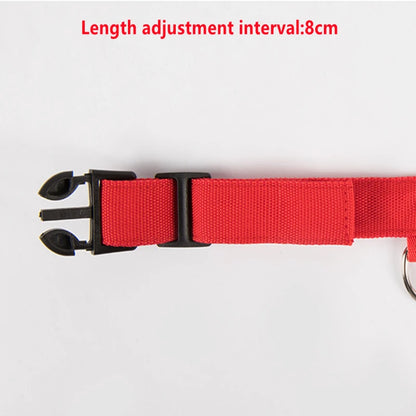 Red belt with black buckle on a white background, showing length adjustment interval.