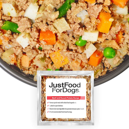Dog food mix with vegetables and a 'Just Food For Dogs' package in the foreground.